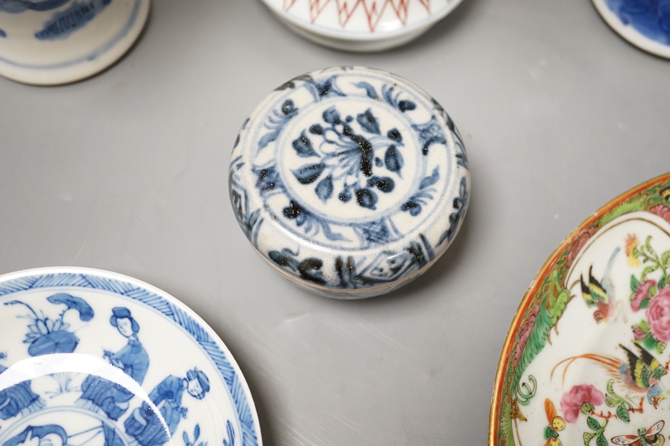 A Japanese Edo period Imari vase, 22. 5 cm, two 19th-century Chinese blue and white baluster vases, an Annamese blue and white box and cover, a Chinese famille rose plates and a blue and white dish